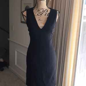 Like new Bebe v-neck sleeveless dress w zipper.